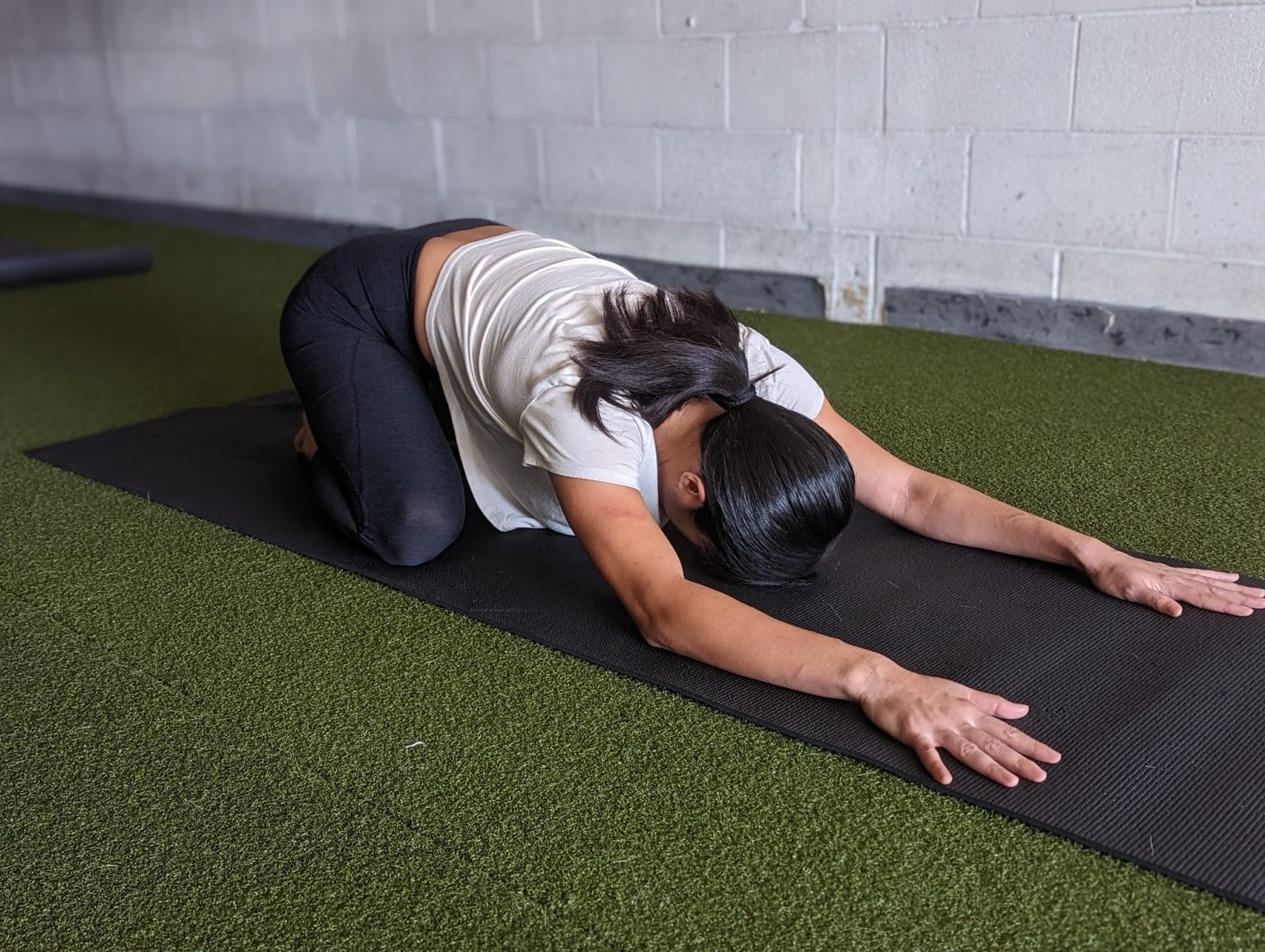 Michelle in child's pose