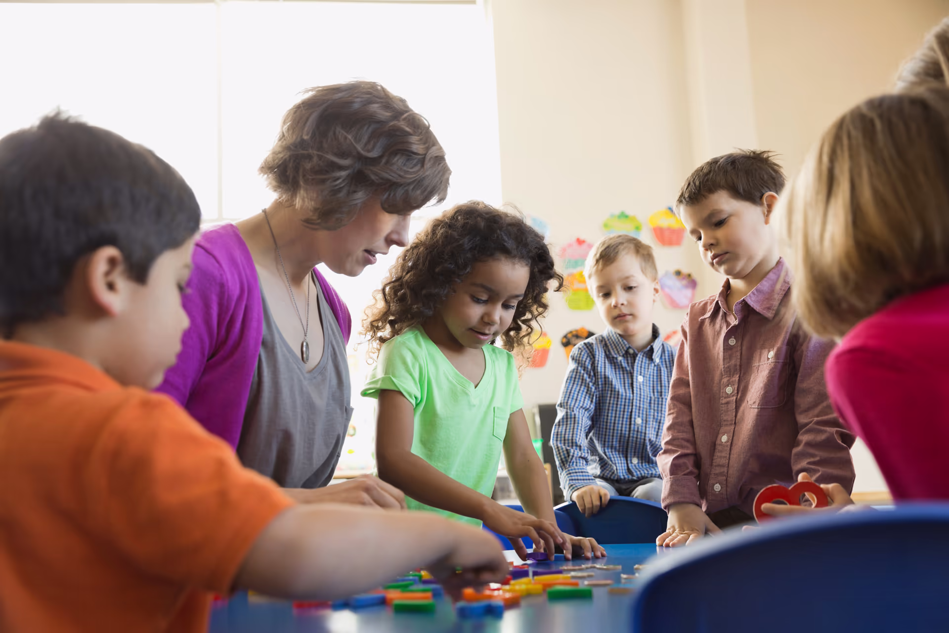 enthusiastic-children-and-teacher-learning-togethe-2026-03-26-04-49-41-utc